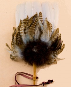 Feather fan with mirror on the back