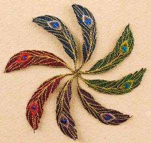 Iron-on feather appliques for art quilts