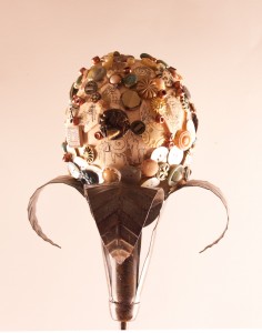 "Artifacts Egg" -  an ostrich egg embellished with buttons, beads, and pieces of ostrich shells