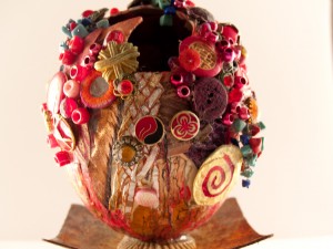 Detail of " Volcano egg" - an ostrich egg embellished with buttons and beads
