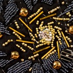 Gold bugle beads in the art quilt, "Fabric of the Universe"