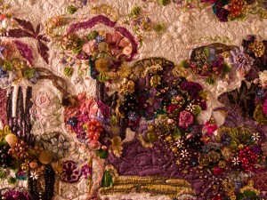 Detail of the contemporary, beaded art quilt, "Dinner for Three on the Banks of the Cabernet"