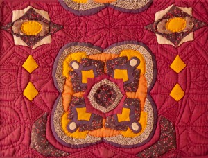 Detail of hand appliqued and quilted center panel in the contemporary art quilt "Seminole Cloud Quilt"
