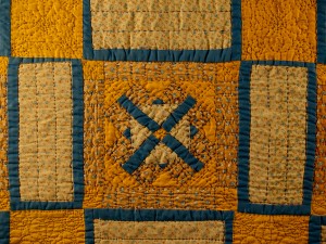 Variation of the traditional quilt block, "Cross and Crown", the first quilt made by Nancy Smeltzer