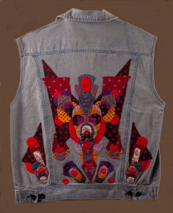 Back of jean vest embellished with hand applique