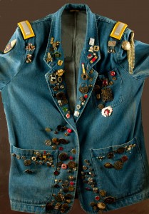 Jean Jacket covered in buttons and pins