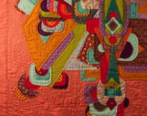 Detail of hand appliqued, contemporary art quilt "Opulence- Still Life with Flowers"