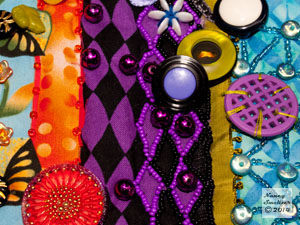 Closeup on the purple and black harlequin ribbon